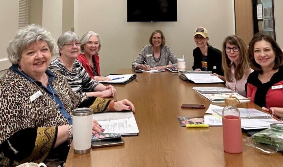 image of women at meeting table